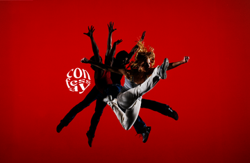 dynamic dance pose against a red background with text