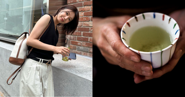 a woman holding a cup of tea