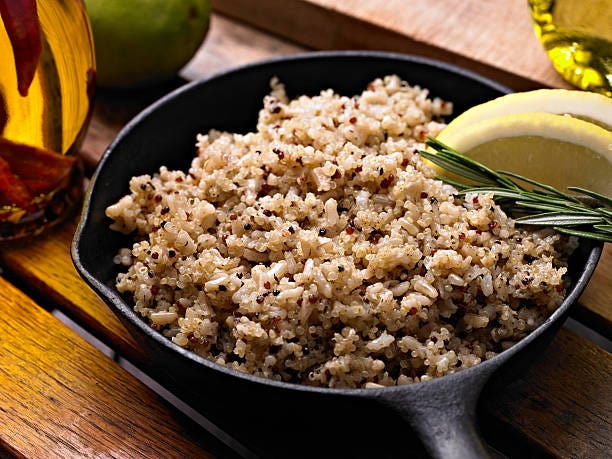 quinoa with brown rice in a cast iron pan