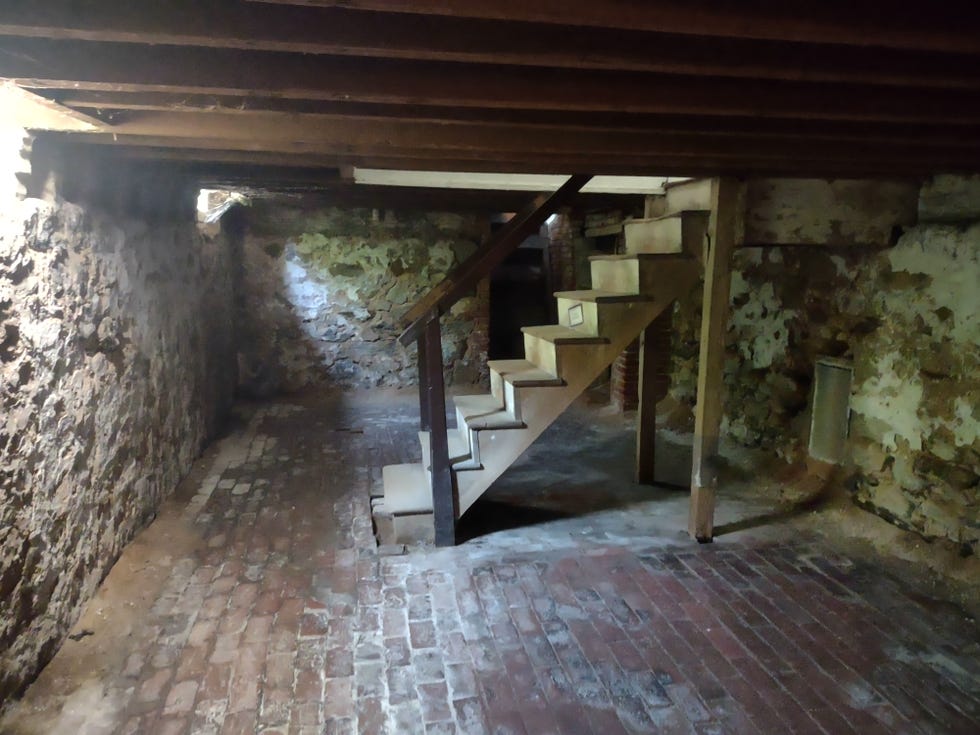 a staircase in a stone building