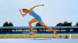 a woman jumping in the air