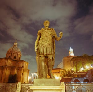 italy, rome, statue of caesar in front of roman forum