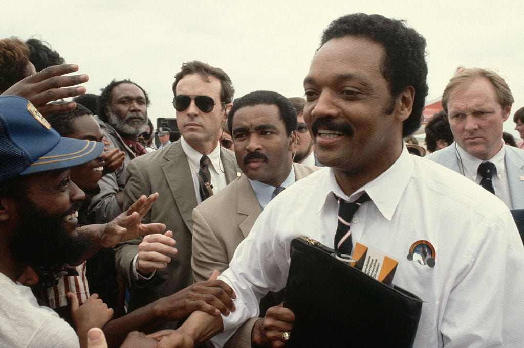 jesse jackson shaking supporters' hands