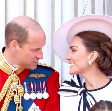 prince william and kate middleton look at one another and smile during the trooping the colour ceremony