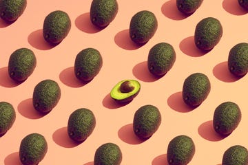 large group of avocados placed in a pattern