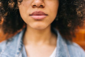 lips and nose of young woman