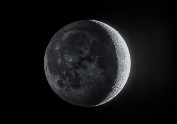 low angle view of moon against sky at night