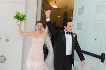 a man and woman in wedding attire