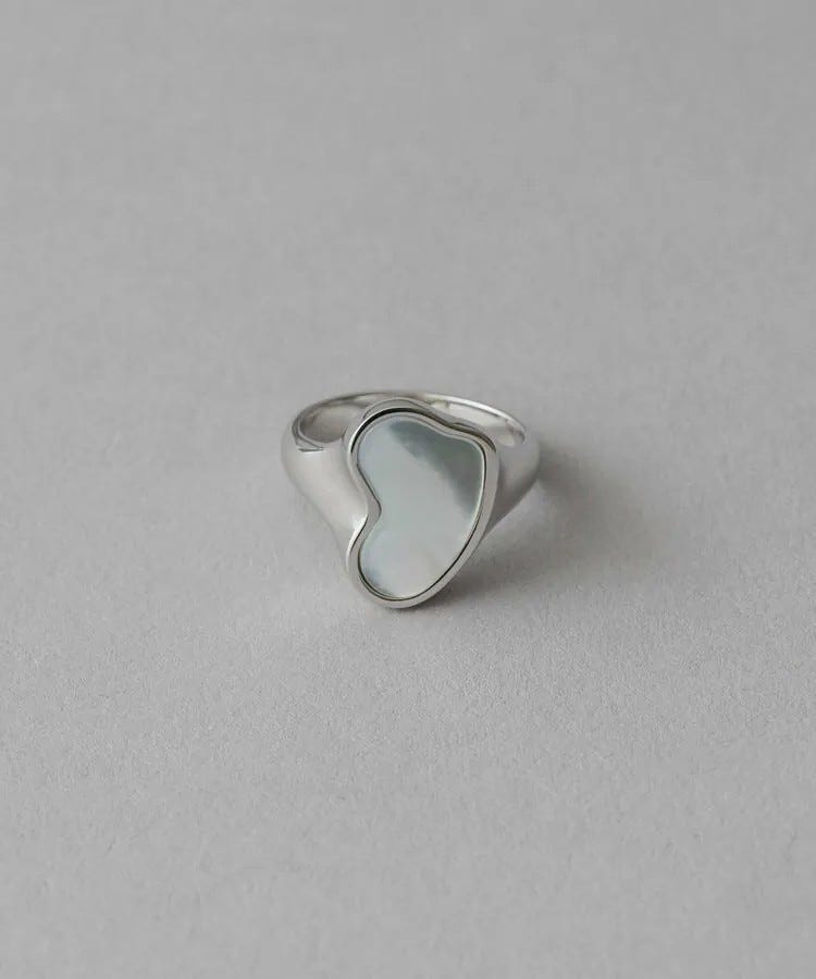 a ring on a white surface