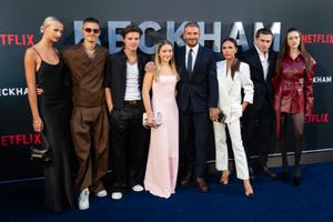 david and victoria beckham and their family posing for a photo at the beckham netflix premiere