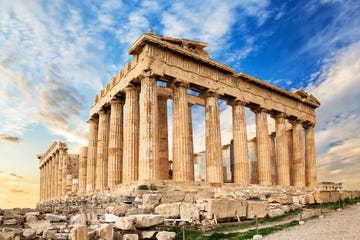 parthenon temple on a sunset acropolis in athens, greece