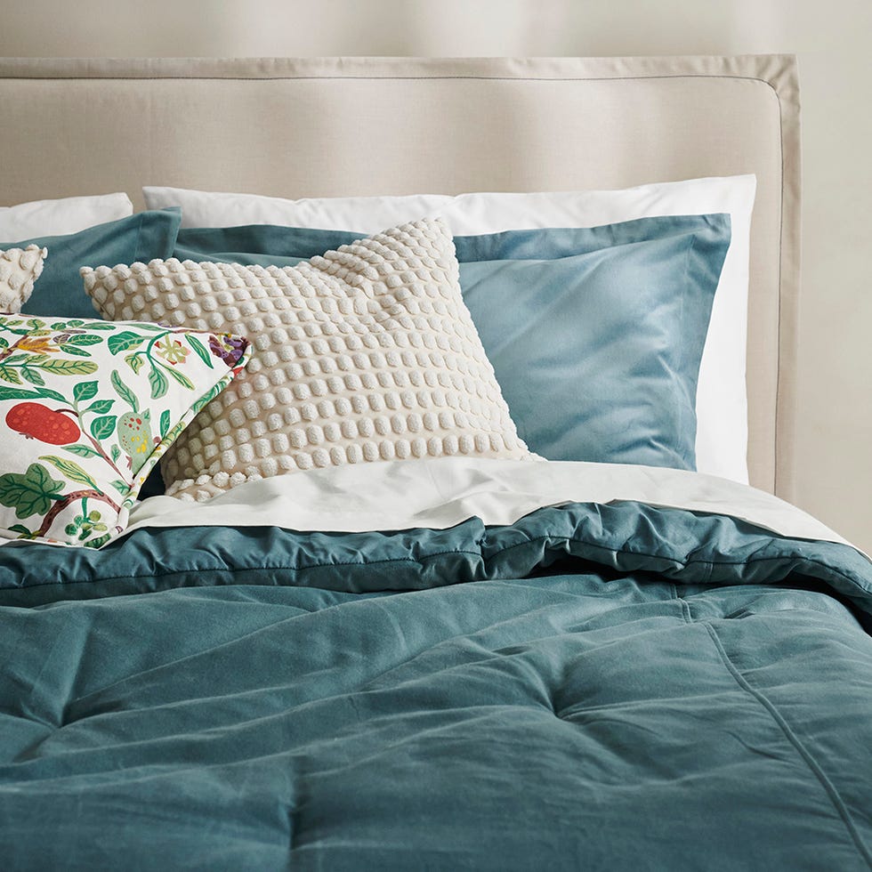 bedding arrangement with decorative pillows