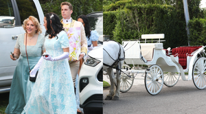 a group of people standing next to a horse carriage