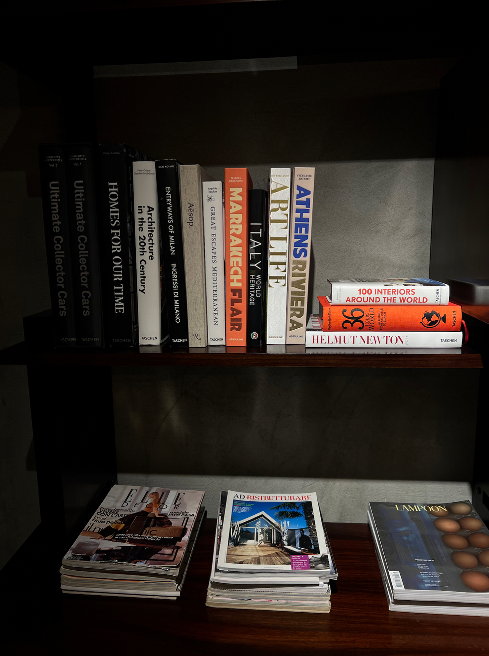 a shelf with books on it, abby silverman influencer tiktok instagram fashion interiors cosmo creative director