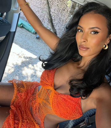 maya jama short curly bob haircut