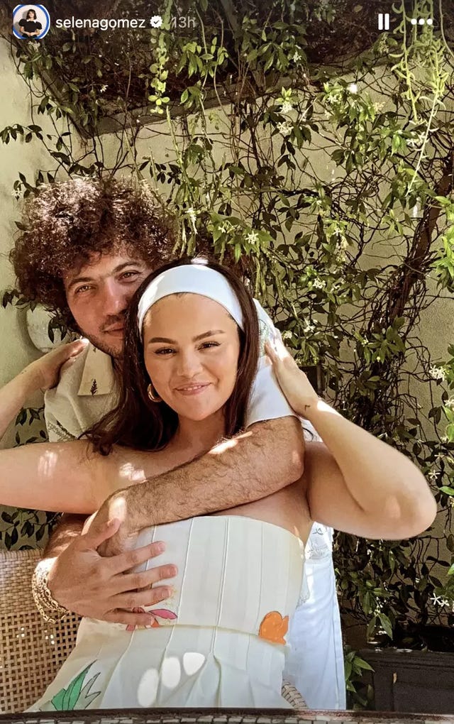 a man and woman posing for a picture