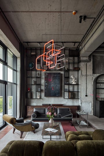 metal, cemento, lineas limpias y un diseno inspirado en una piloto de carreras, cualquier trotamundos querria vivir en este loft