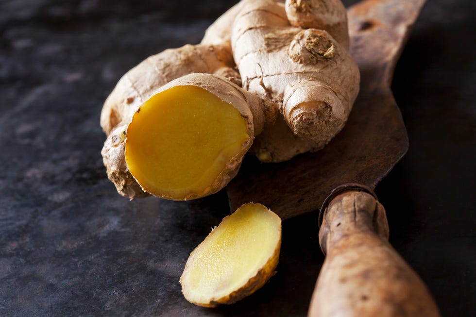 sliced ginger root on an old knife