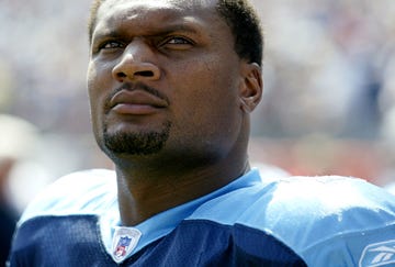 steve mcnair looks bold and defiant standing on the football pitch in his uniform