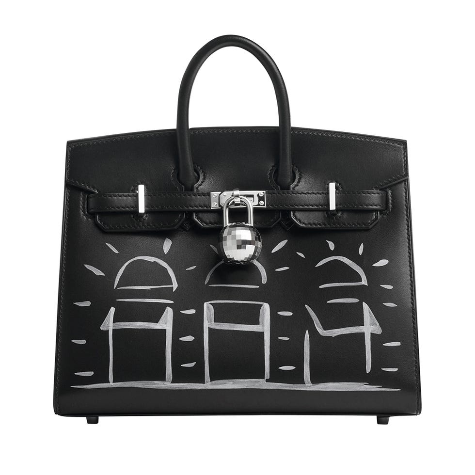 a black handbag with a white text on it