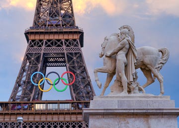 eiffel tower dons olympic rings for paris 2024