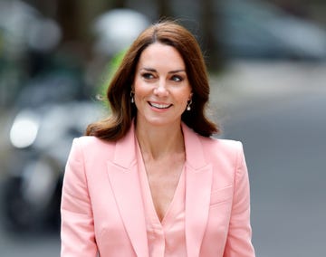 kate middleton smiles in a pink suit