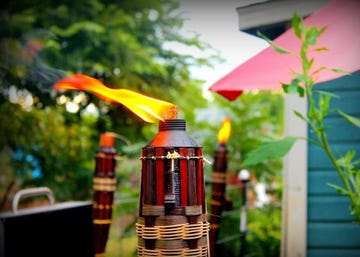 tiki torches in backyard