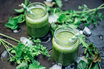 two glasses of wild herb smoothie with apple, banana and lime juice