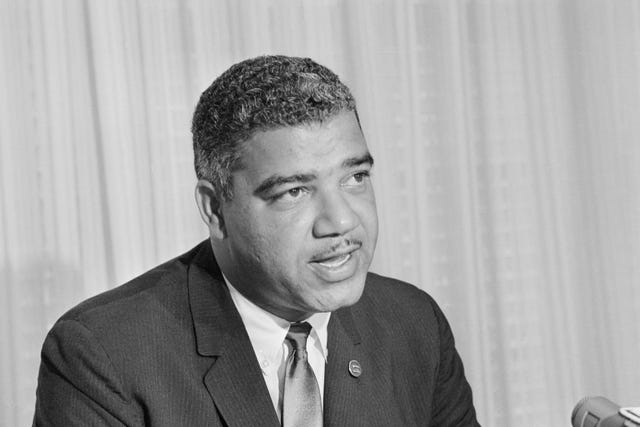 Whitney M. Young, Jr reads a statement condemning the racial violence sweeping the country as unjustified during a news conference