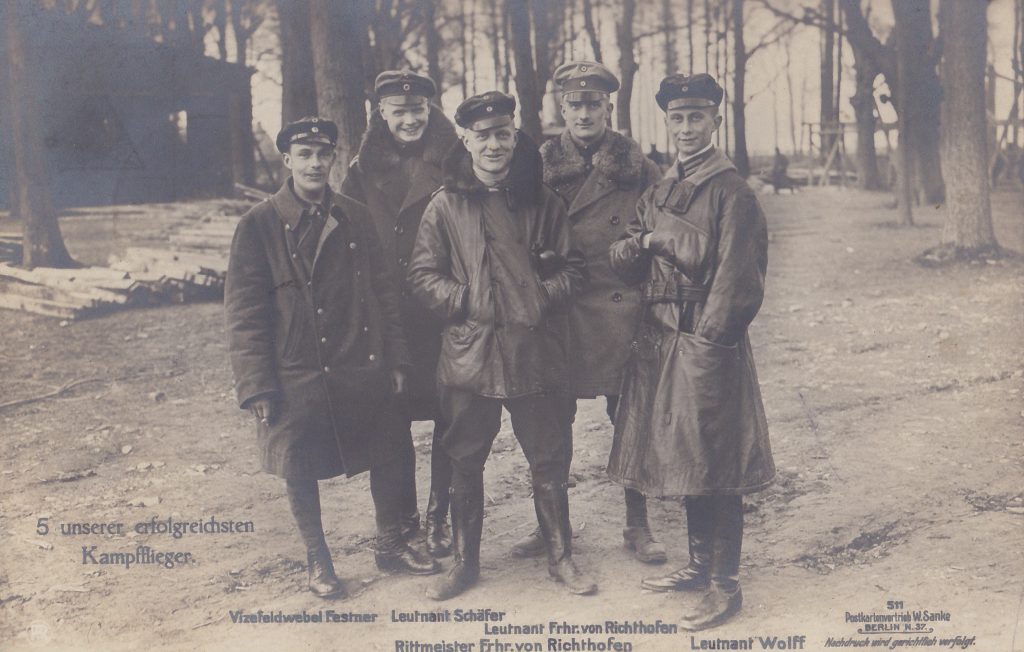 A group of men posing, the Red Baron group