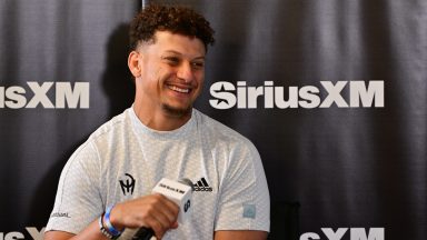 ST JOSEPH, MISSOURI - AUGUST 13: Patrick Mahomes participates in Sirius XM's  NFL Radio Town Hall with Andy Reid and the Kansas City Chiefs at Missouri Western State University on August 13, 2024 in St Joseph, Missouri. (Photo by Fernando Leon/Getty Images for SiriusXM)