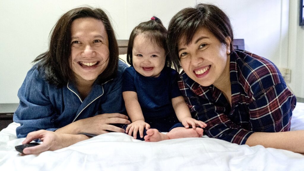 Hailee, with her parents, Giorjean and France.