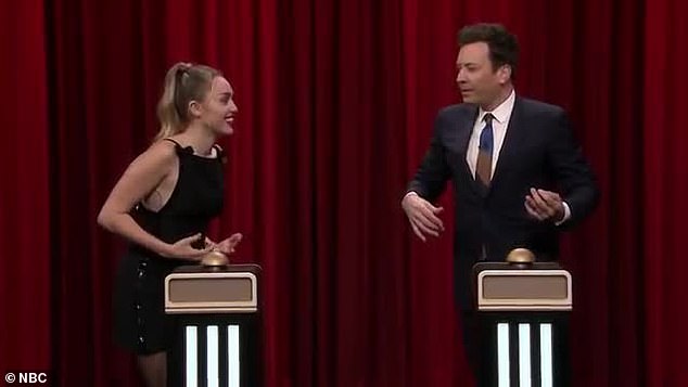 Competitive: Miley was fired up after Jimmy correctly identified the first two tunes