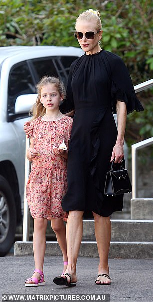 Mum's the word! Nicole looked effortlessly glam in a black frock as she was joined by her daughter Faith