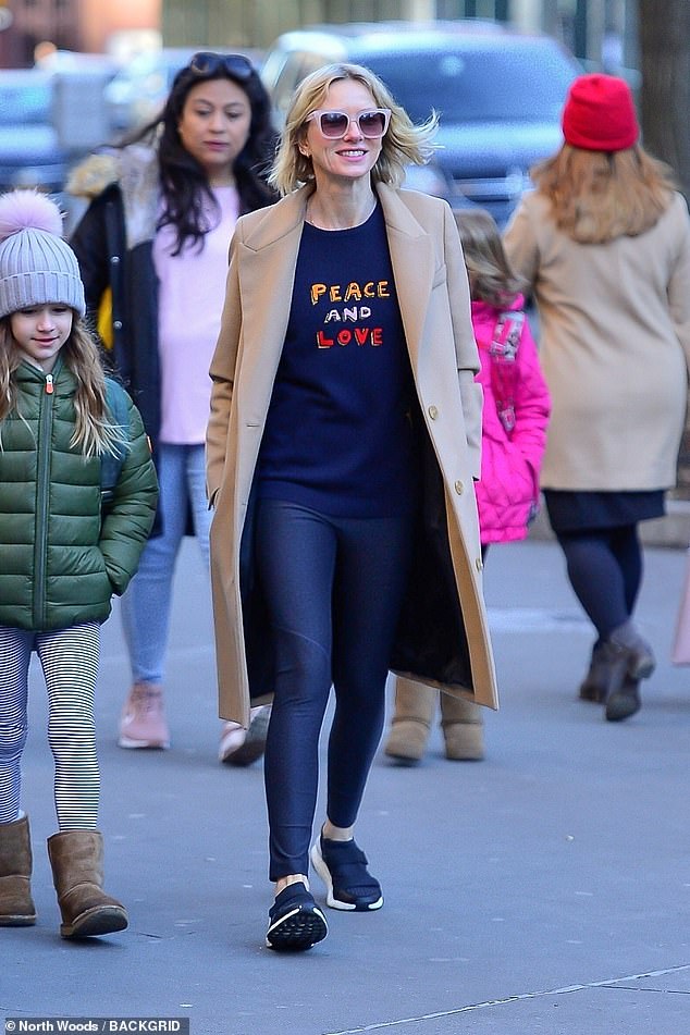 Outfit change! Earlier in the day, the blonde was seen strolling the sidewalks wearing different shoes and a pair of black leggings