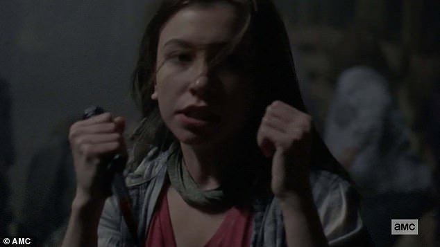 Tough girl: Enid was shown fighting for her life against the Whisperers before her gruesome end