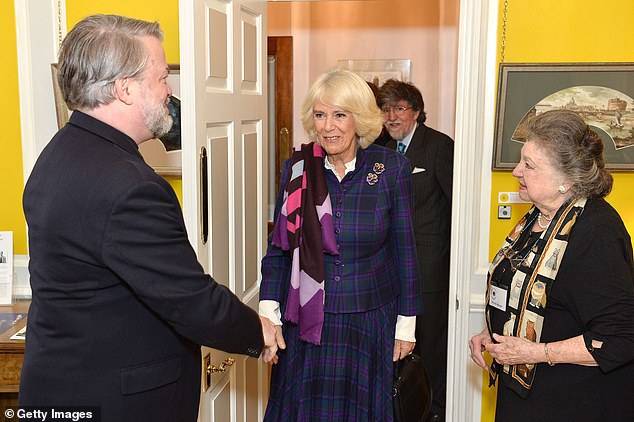 The Duchess of Cornwall was the picture of elegance as she attended a new exhibition at the Fan Museum in Greenwich, London, today