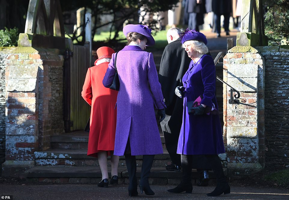 The Princess Royal and the Duchess of Cornwall chatted animatedly as they made their way up the steps behind the Queen