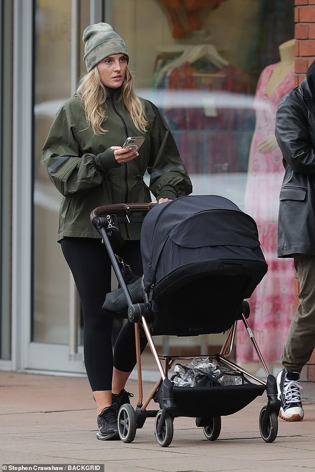 Dressed down: She attempted to keep things low-key during the afternoon stroll