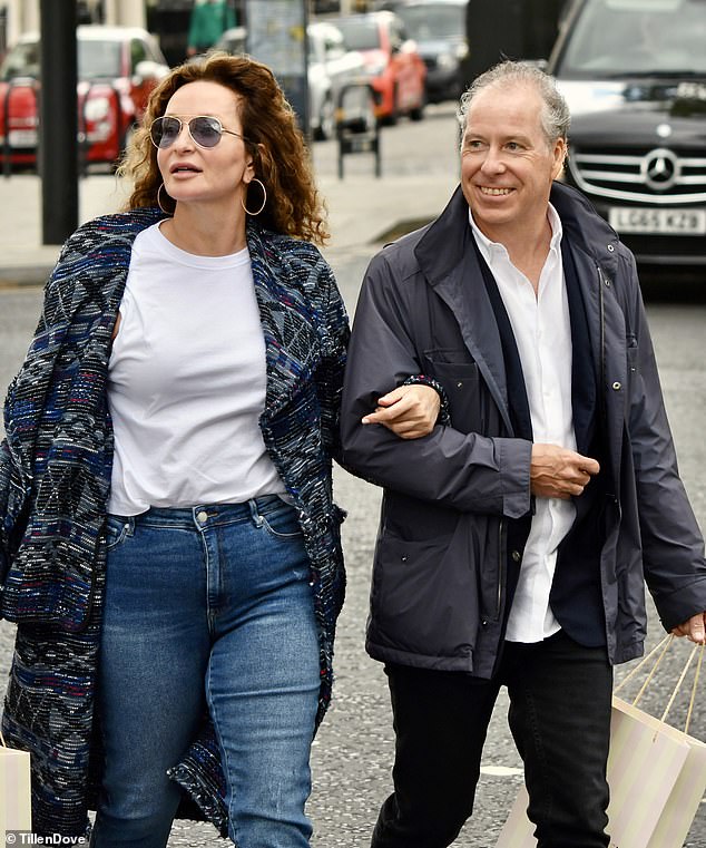 Earl of Snowdon, David Linley with Isabelle Chopin De La Bruyere - a director of Christie's - in Central London