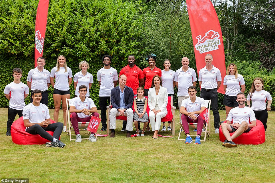 William, Kate and Charlotte all posed for a group photograph during a visit to SportsAid House amid the Commonwealth Games