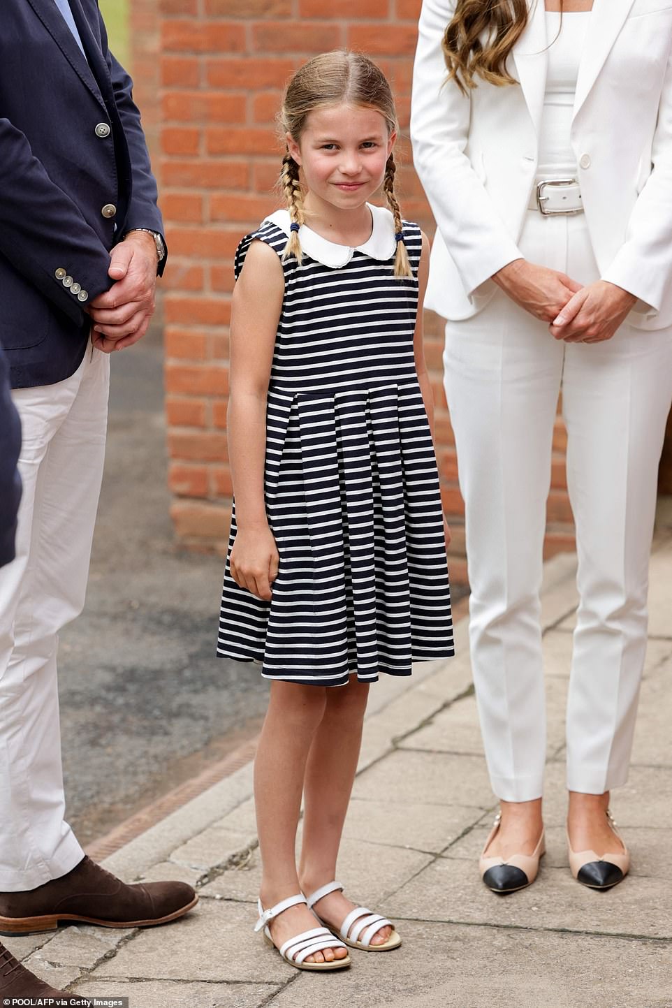 Princess Charlotte was dressed in a Rachel Riley black and white striped dress foe the outing in Birmingham this afternoon