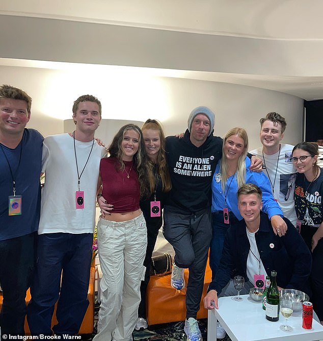 Brooke (pictured, fourth from right) was thrilled to be catching up with Chris Martin