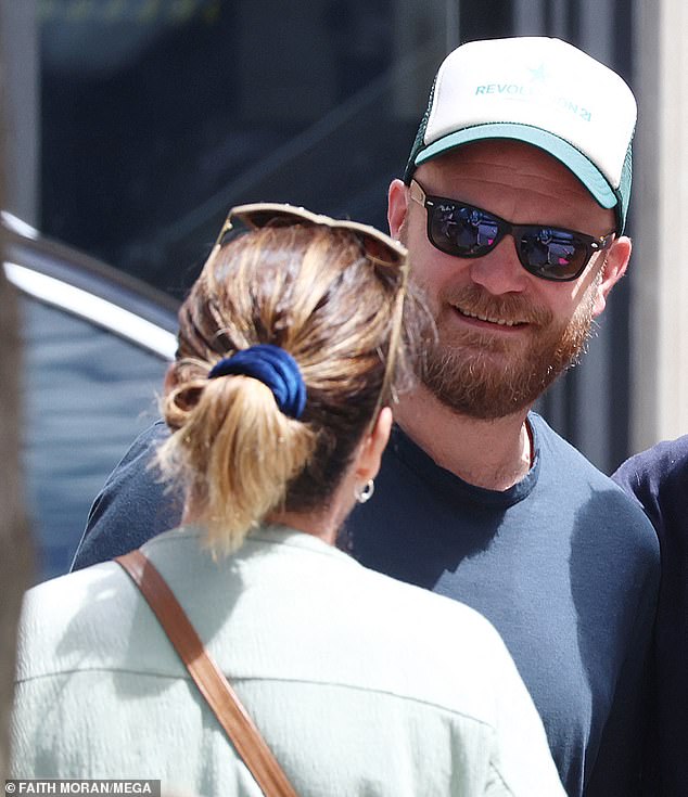 Coldplay recently performed two special shows to packed crowds in Perth, Western Australia. And on Monday, their drummer Will Champion (pictured) looked to be in good spirits as he was spotted chatting to fans outside his hotel