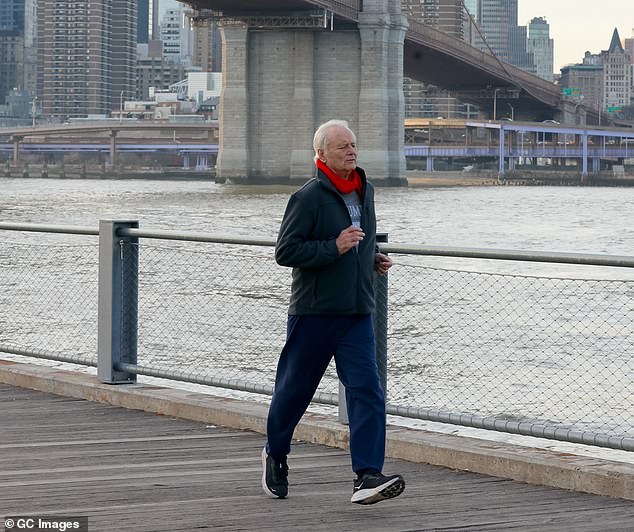 The Caddyshack star was filmed running underneath a bridge along the water