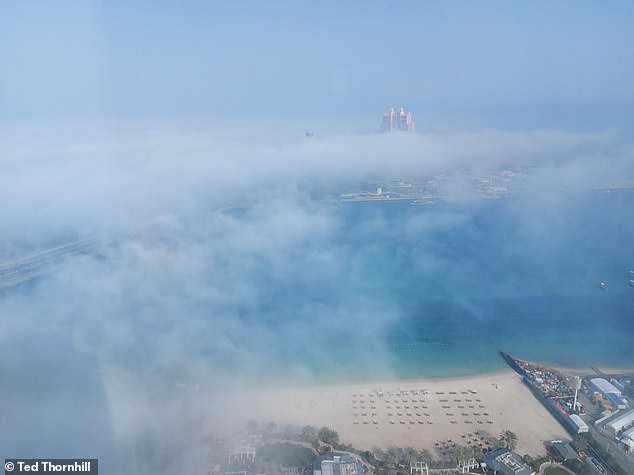 This is the view from Ted's room out over the hotel's private beach to a mini peninsula breakwater that¿s home to the majestic Rixos Marina hotel ¿ designed as a colossal arch