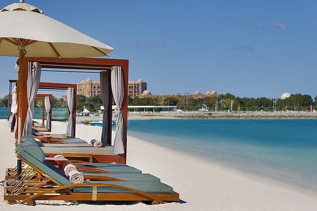 The hotel's private beach (above) up close, accessed via a gilded subway