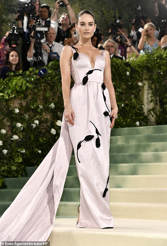 Lily James attends The Metropolitan Museum of Art's Costume Institute benefit gala celebrating the opening of the "Sleeping Beauties: Reawakening Fashion" exhibition on Monday, May 6, 2024, in New York. (Photo by Evan Agostini/Invision/AP)