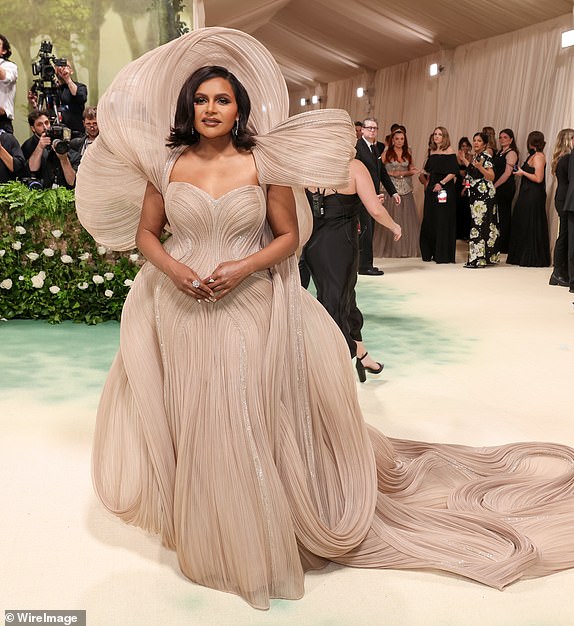 NEW YORK, NEW YORK - MAY 06: Mindy Kaling attends The 2024 Met Gala Celebrating "Sleeping Beauties: Reawakening Fashion" at The Metropolitan Museum of Art on May 06, 2024 in New York City. (Photo by John Shearer/WireImage)