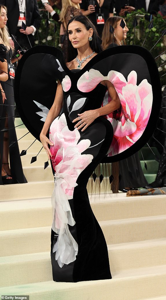 NEW YORK, NEW YORK - MAY 06: Demi Moore attends The 2024 Met Gala Celebrating "Sleeping Beauties: Reawakening Fashion" at The Metropolitan Museum of Art on May 06, 2024 in New York City. (Photo by Dia Dipasupil/Getty Images)